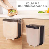 Foldable cabinet dustbin